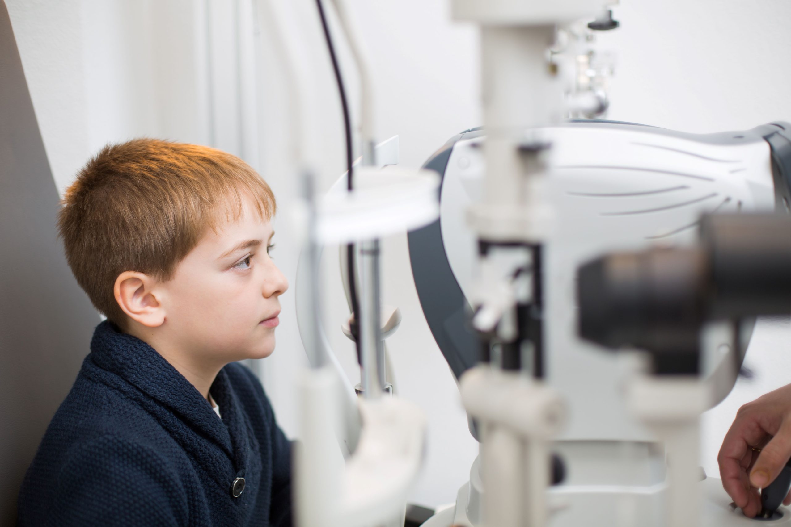 optician testing a boy s eyes 2022 03 04 05 54 15 utc scaled